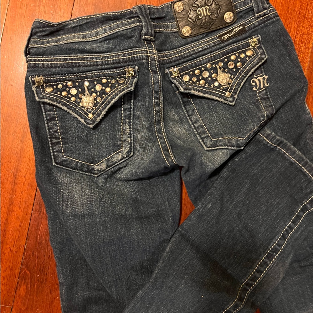 Miss Me jeans, classic fit, fitted through the hip and thigh.